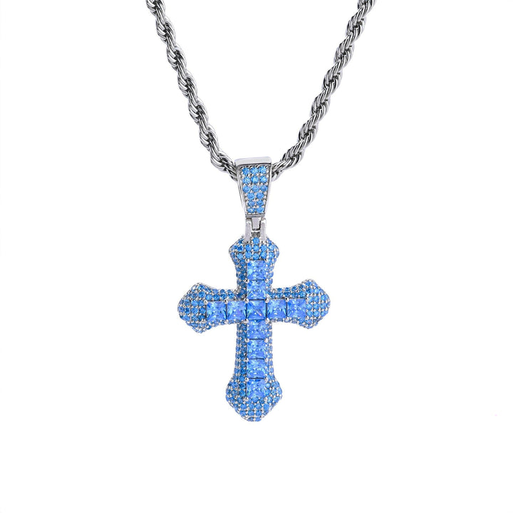 Close-up of the Blue  Frosty Cross Pendant in 925 Sterling Silver with a blue gemstone and VVS Moissanite, on a sleek rope chain.