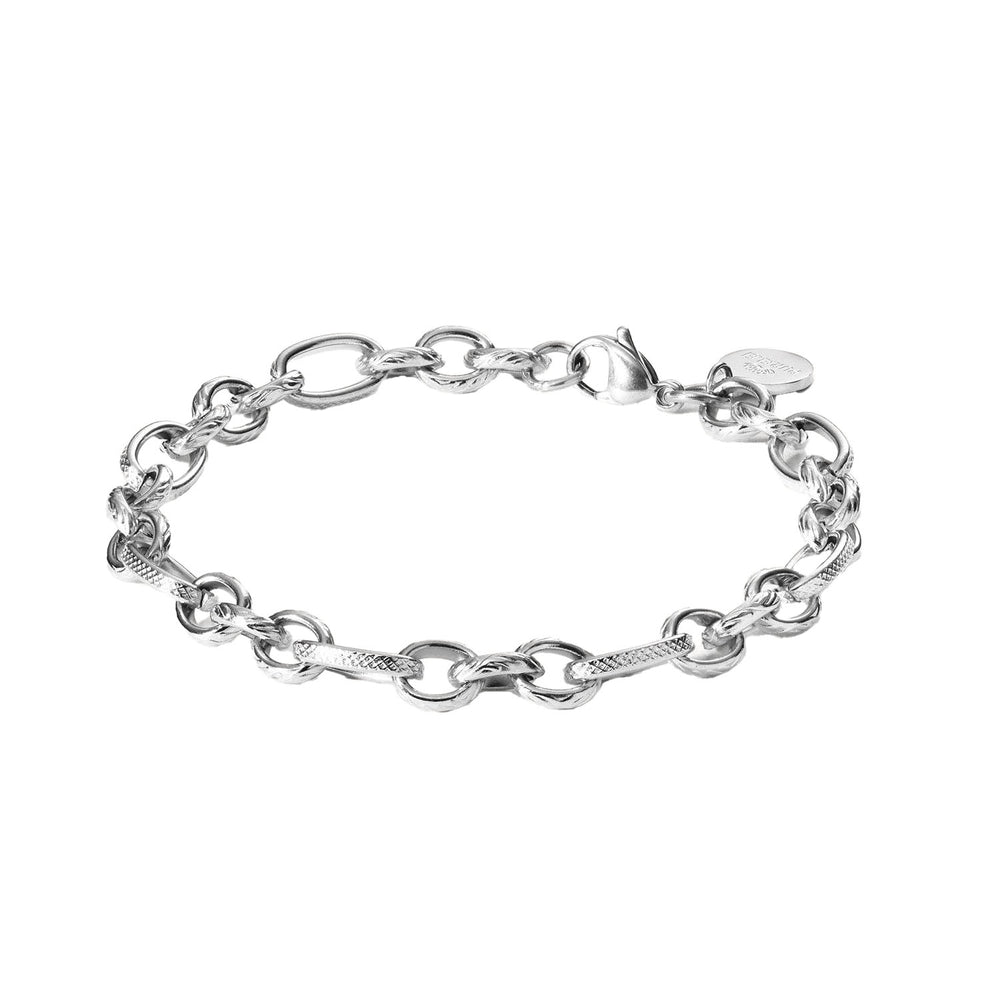 Silver Fashion Show Bracelet by PURELEI with matt finish and adjustable links, perfect for layering.