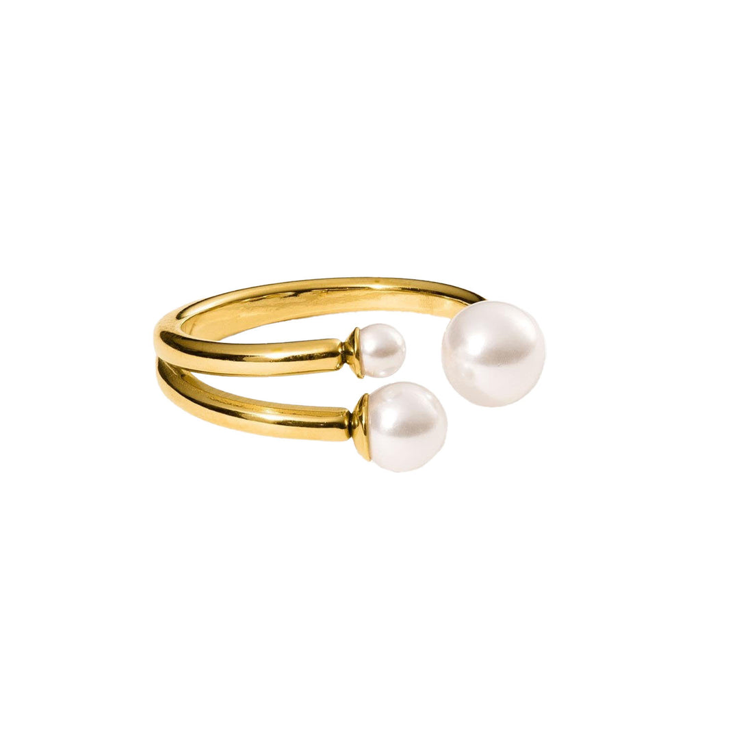 Close-up of the PURELEI Finesse Ring in gold, featuring elegant embedded sea shell pearls.