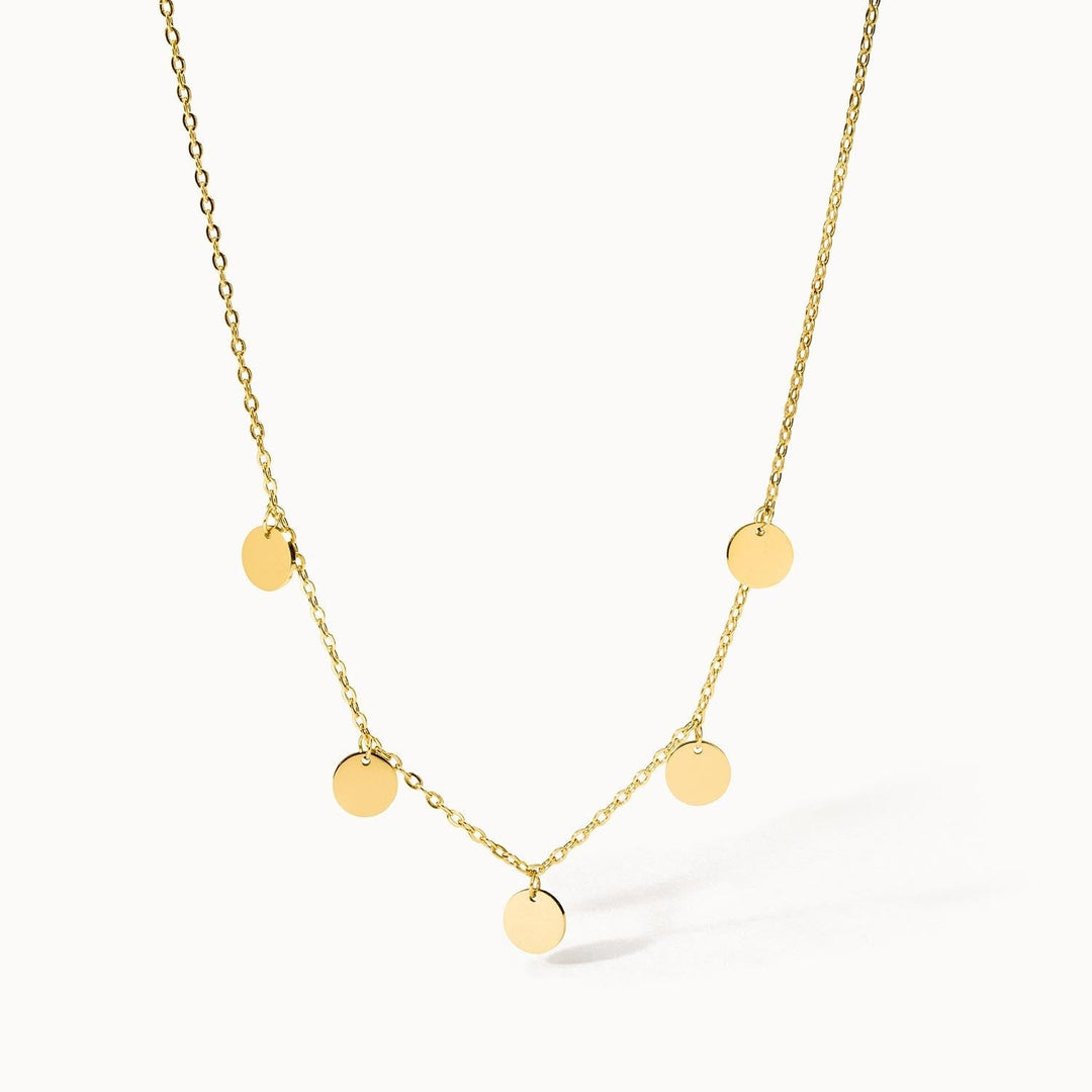 Ultra Close-up of the PURELEI Kalea Necklace in gold, featuring a dainty pendant and adjustable chain, perfect for layering.