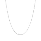 Close-up of PURELEI Li'ili'i Necklace Silver, a delicate stainless steel chain perfect for layering with an adjustable length.