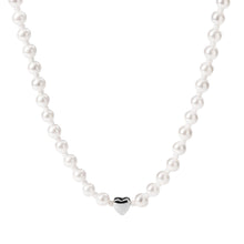 Close-up of the PURELEI Lovely Necklace in silver, featuring a heart pendant and a mix of seashell and glass pearls for an elegant look.