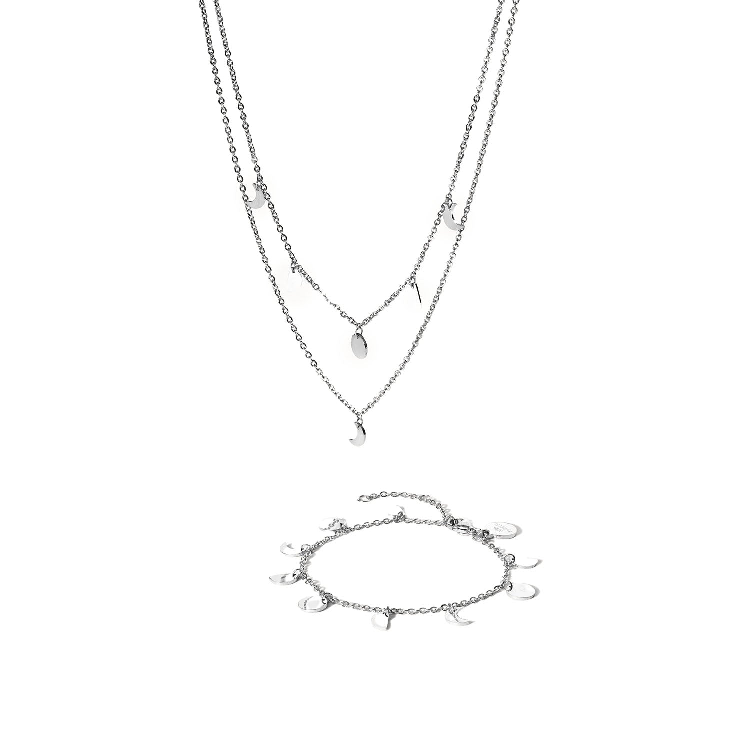 Close-up of the PURELEI Luna Set in silver, featuring a moon phase necklace and matching bracelet with delicate moon-shaped charms.