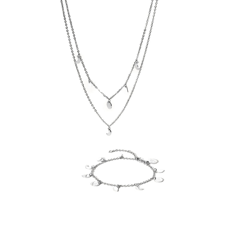 Close-up of the PURELEI Luna Set in silver, featuring a moon phase necklace and matching bracelet with delicate moon-shaped charms.