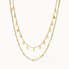 Ultra Close-up of PURELEI Plain Necklace Gold: double-layered design with bead details and coin pendants, adjustable length 40-45 cm.