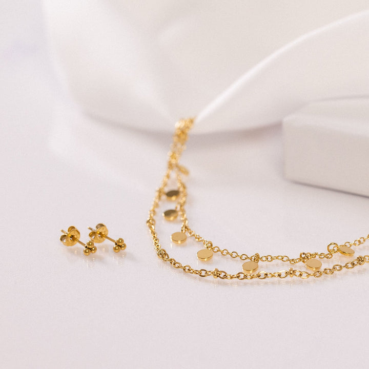 PURELEI Plain Necklace Gold with matching earrings: double-layered design, bead details, coin pendants, and elegant gold finish.