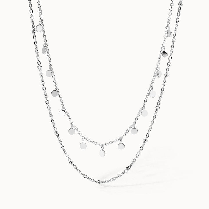 Ultra Close-up of PURELEI Plain Necklace Silver: double-layered design with bead details and coin pendants, adjustable length 40-45 cm.