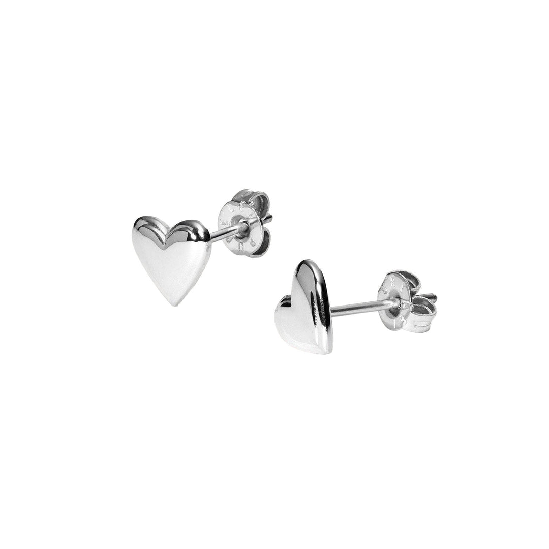 Close-up of PURELEI Secret Love Earrings silver, delicate heart-shaped studs in stainless steel for a romantic touch.